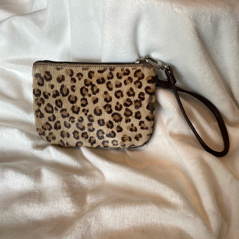 Express short hair lil wallet wristlet gently used . Pet n smoke free home